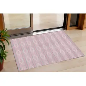 Photo of Pink Ivory And Gray Geometric Washable Indoor Outdoor Area Rug