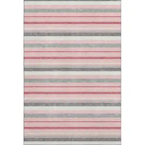 Photo of Pink Ivory And Gray Striped Washable Area Rug With UV Protection