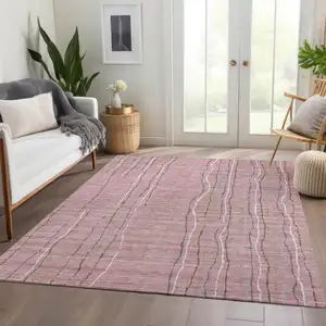 Photo of Pink Ivory And Gray Striped Washable Area Rug With UV Protection