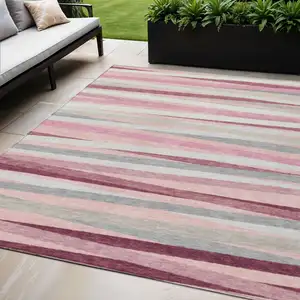 Photo of Pink Ivory And Gray Striped Washable Indoor Outdoor Area Rug