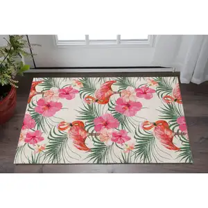 Photo of Pink Ivory And Green Geometric Washable Area Rug With UV Protection