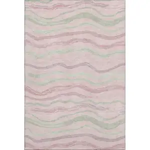 Photo of Pink Ivory And Mint Green Striped Washable Area Rug With UV Protection