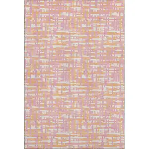 Photo of Pink Ivory And Orange Abstract Geometric Washable Area Rug With UV Protection