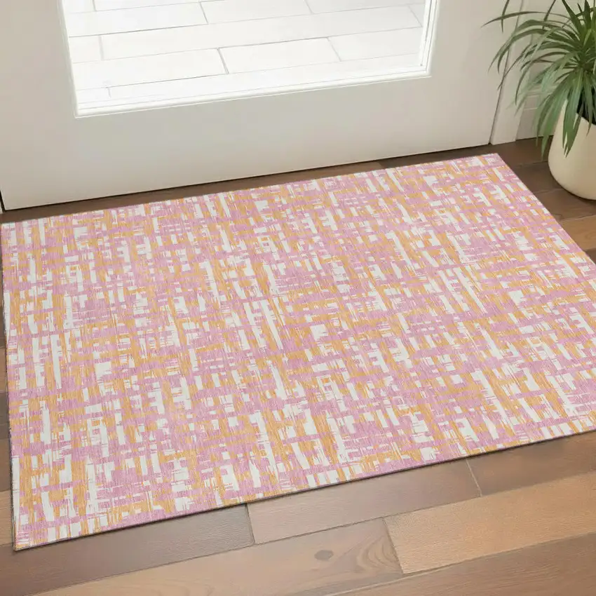 Pink Ivory And Orange Abstract Geometric Washable Area Rug With UV Protection Photo 1