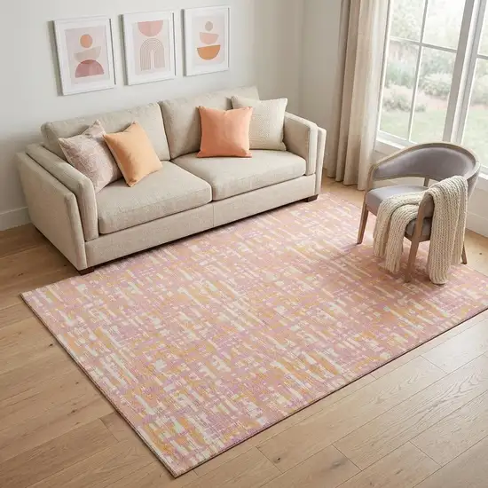 Pink Ivory And Orange Abstract Geometric Washable Area Rug With UV Protection Photo 1