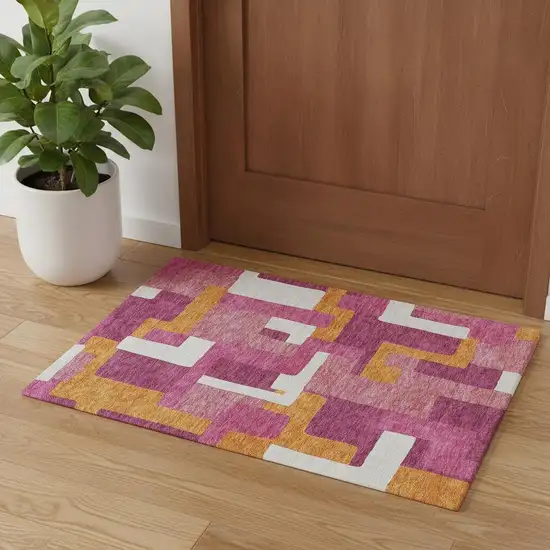 Pink Ivory And Orange Geometric Washable Area Rug With UV Protection Photo 1