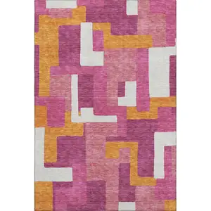 Photo of Pink Ivory And Orange Geometric Washable Area Rug With UV Protection