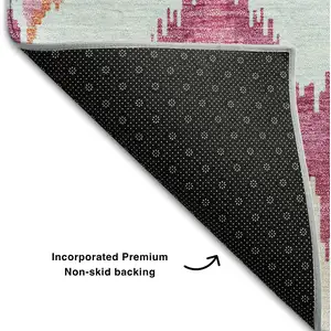 Photo of Pink Ivory And Orange Ikat Washable Area Rug With UV Protection