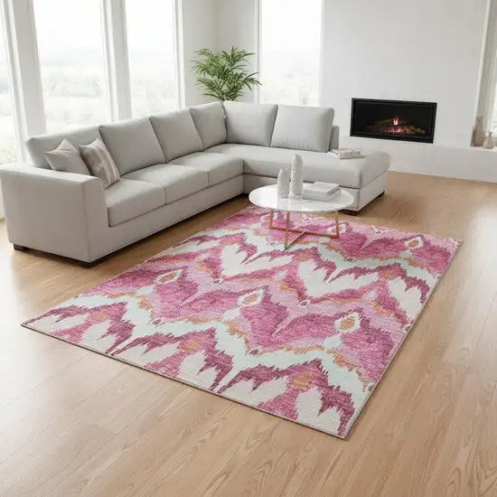 Pink Ivory And Orange Ikat Washable Area Rug With UV Protection Photo 2