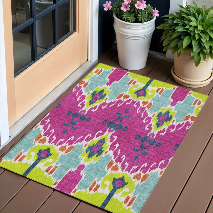 Pink Lime Green And Orange Ikat Washable Indoor Outdoor Area Rug Photo 1