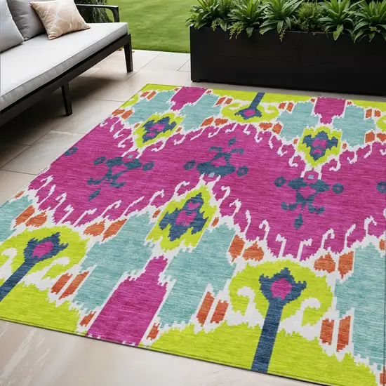 Pink Lime Green And Orange Ikat Washable Indoor Outdoor Area Rug Photo 1