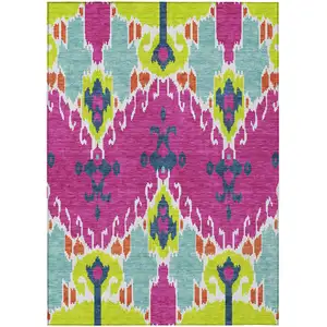 Photo of Pink Lime Green And Orange Ikat Washable Indoor Outdoor Area Rug