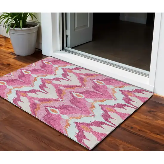 Pink Mauve And Orange Ikat Washable Indoor Outdoor Area Rug Photo 1