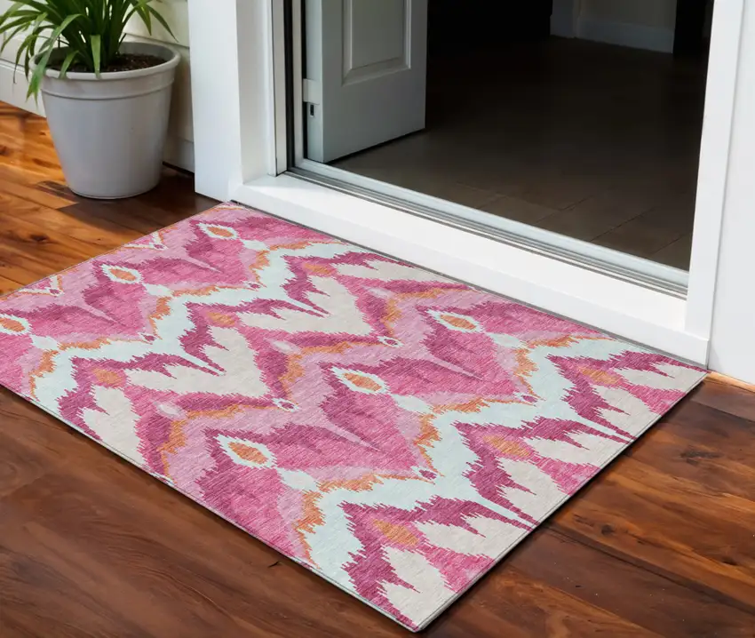 Pink Mauve And Orange Ikat Washable Indoor Outdoor Area Rug Photo 1