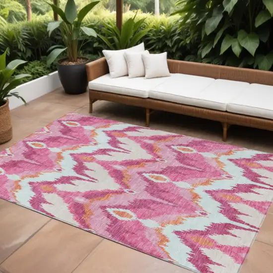 Pink Mauve And Orange Ikat Washable Indoor Outdoor Area Rug Photo 1