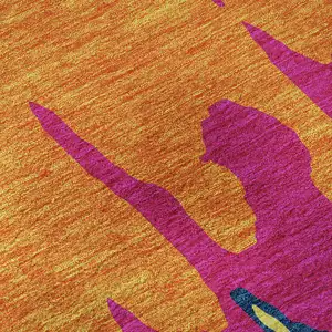 Photo of Pink Orange Blue And Lime Green Abstract Washable Area Rug With UV Protection