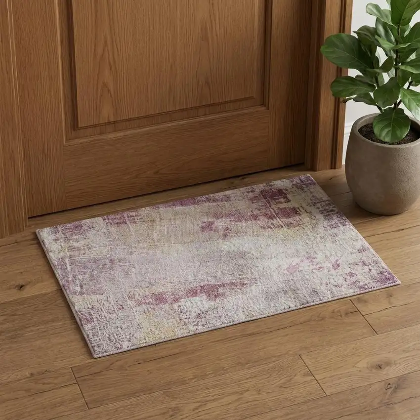 Pink Peach And Ivory Abstract Washable Area Rug With UV Protection Photo 1