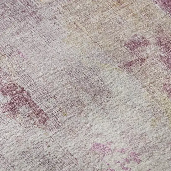 Pink Peach And Ivory Abstract Washable Area Rug With UV Protection Photo 1