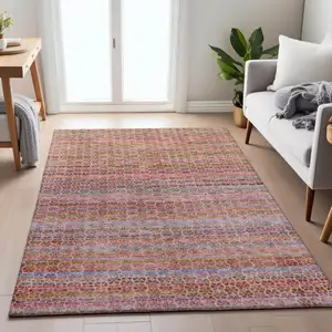 Photo of Pink Purple And Gold Striped Washable Indoor Outdoor Area Rug