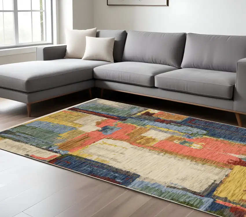 Pink Red And Yellow Abstract Area Rug With Fringe Photo 1