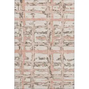 Photo of Pink Taupe And Beige Striped Washable Area Rug With UV Protection