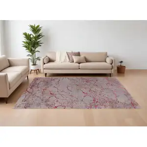 Photo of Pink Taupe and Gray Abstract Power Loom Area Rug