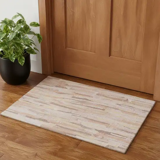 Pink Yellow And Peach Striped Washable Area Rug With UV Protection Photo 1