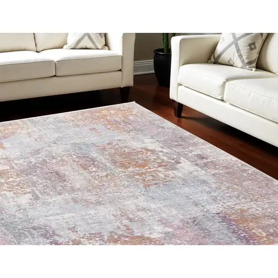 Pink and Blue Oriental Power Loom Worn Faded Area Rug With Fringe Photo 1