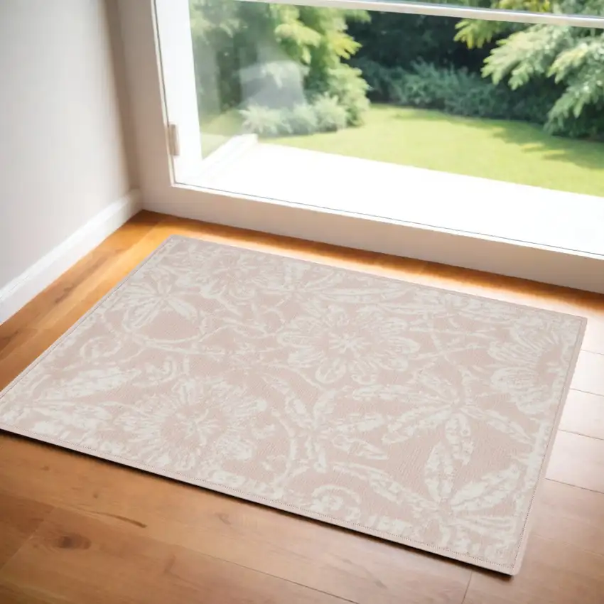 Pink and Ivory Floral Distressed Area Rug Photo 1