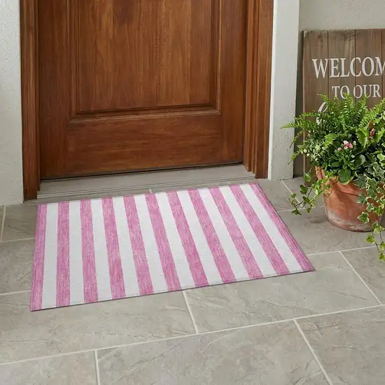 Pink and White Striped Washable Non Skid Indoor Outdoor Area Rug Photo 1