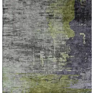 Photo of Plum And Green Abstract Washable Area Rug With UV Protection