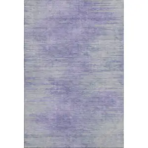Photo of Plum And Ivory Abstract Washable Area Rug With UV Protection