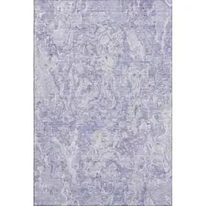 Photo of Plum And Ivory Abstract Washable Area Rug With UV Protection