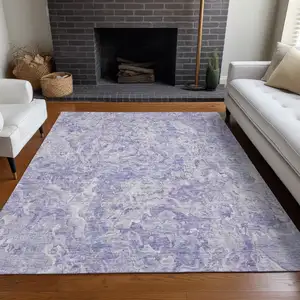 Photo of Plum And Ivory Abstract Washable Area Rug With UV Protection