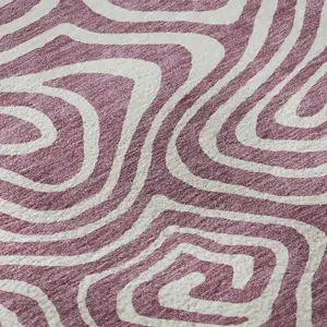Photo of Plum And Ivory Abstract Washable Area Rug With UV Protection