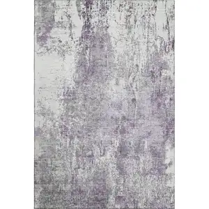 Photo of Plum And Ivory Abstract Washable Area Rug With UV Protection