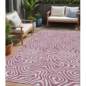 Photo of Plum And Ivory Abstract Washable Indoor Outdoor Area Rug