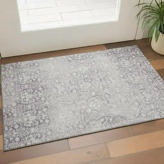 Plum And Ivory Damask Washable Area Rug With UV Protection Photo 2