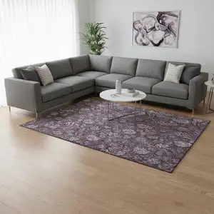 Photo of Plum And Ivory Floral Washable Area Rug With UV Protection