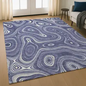 Photo of Plum And Ivory Geometric Washable Area Rug With UV Protection