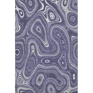 Photo of Plum And Ivory Geometric Washable Area Rug With UV Protection