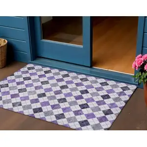 Photo of Plum And Ivory Geometric Washable Indoor Outdoor Area Rug