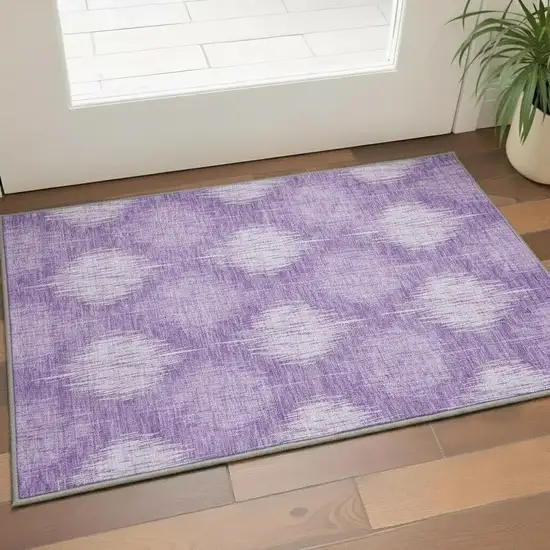 Plum And Ivory Ikat Washable Area Rug With UV Protection Photo 2