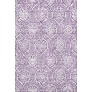 Photo of Plum And Ivory Medallion Washable Area Rug With UV Protection
