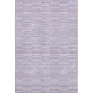 Photo of Plum And Ivory Striped Washable Area Rug With UV Protection