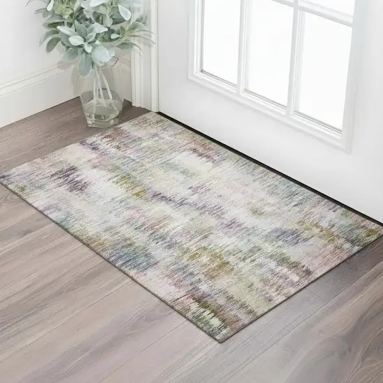 Plum Gold And Ivory Abstract Washable Area Rug With UV Protection Photo 1