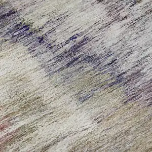 Photo of Plum Gold And Ivory Abstract Washable Area Rug With UV Protection