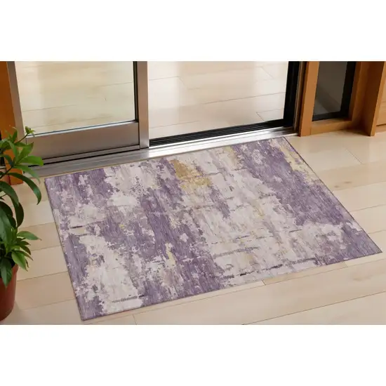 Plum Ivory And Gold Abstract Washable Indoor Outdoor Area Rug Photo 1