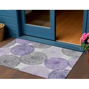 Photo of Plum Ivory And Khaki Abstract Washable Indoor Outdoor Area Rug