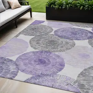 Photo of Plum Ivory And Khaki Abstract Washable Indoor Outdoor Area Rug
